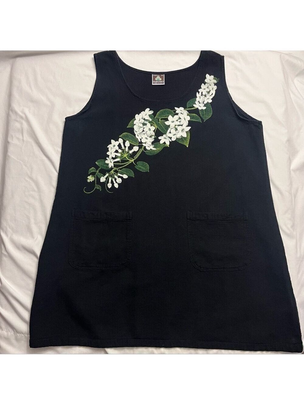 Black Sleeveless Top with Floral Design